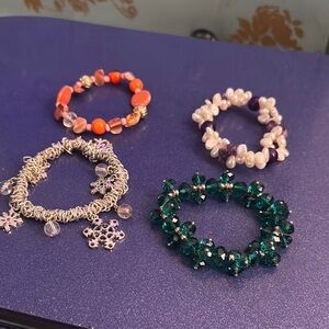 One lot of different textures of stretch bracelets .